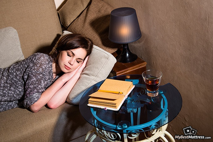 Vivid Dreams - a woman asleep with a dream dictionary by her side.
