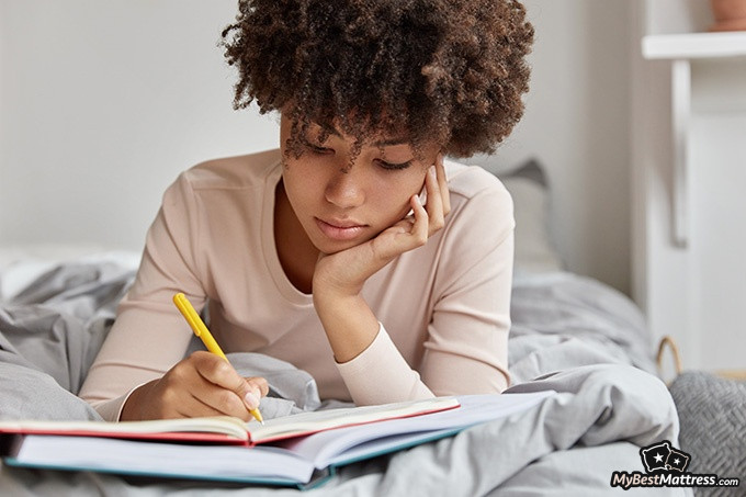 Vivid Dreams - a woman writing in her dream journal.