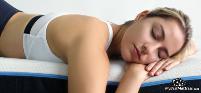 Bear Pro Mattress Review: woman lying on a Bear mattress. Bear Pro Mattress Review: woman lying on a Bear mattress.