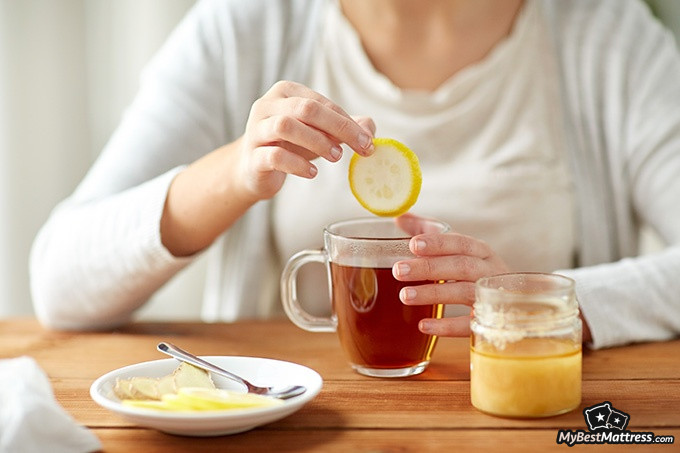 Best Tea For Sleep: Woman drinking black tea fir breakfast.