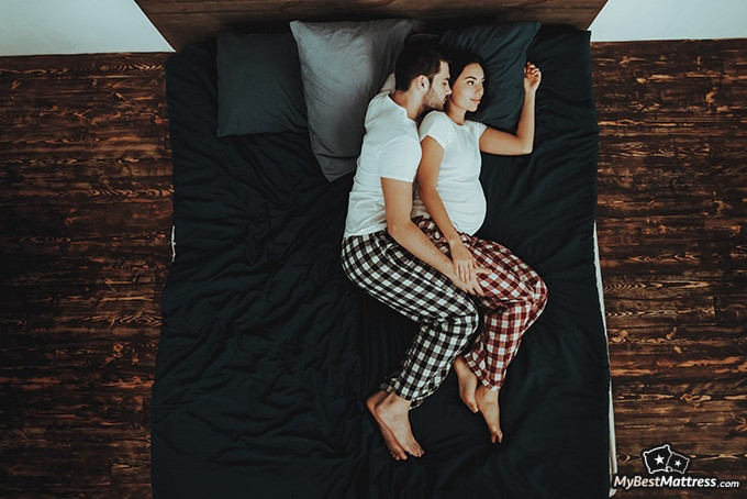 Brooklyn Bedding Aurora Review: a couple cuddling.