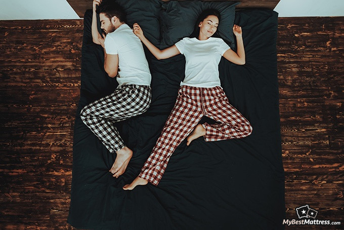 Brooklyn Bedding Aurora Review: a couple sleeping in various poses.