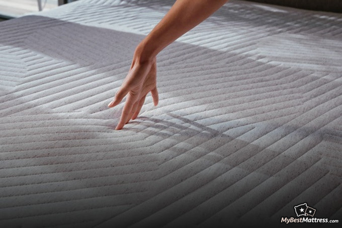 Casper Element Review: touching the Casper mattress. Casper Element Review: touching the Casper mattress.