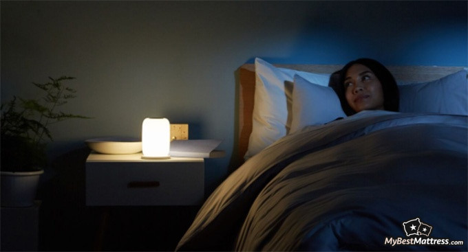 Casper Element Review: woman lying on a casper mattress. Casper Element Review: woman lying on a casper mattress.