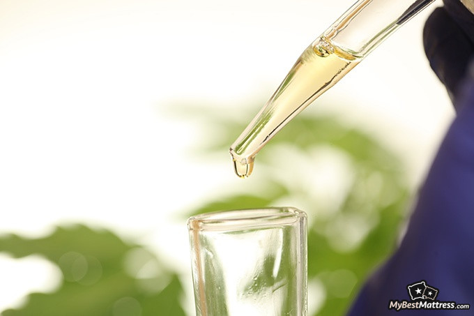 CBD Oil Dosage For Sleep: dropper of CBD oil.