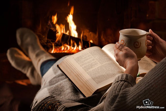 How to fix sleep schedule: drinking tea by the fire and reading book