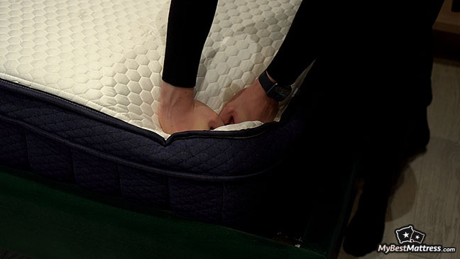 Brooklyn Bedding Aurora Review: edge support demonstration.