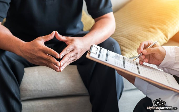 magnesium for sleep: man having a doctor's appointment