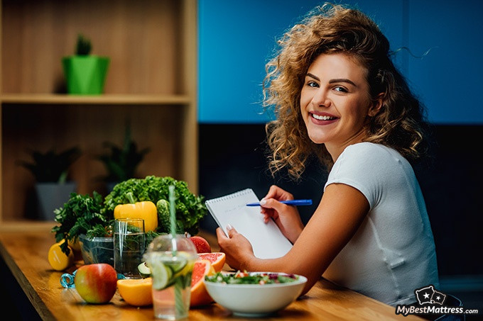 How to cure insomnia: a woman planning her diet. How to cure insomnia: a woman planning her diet.