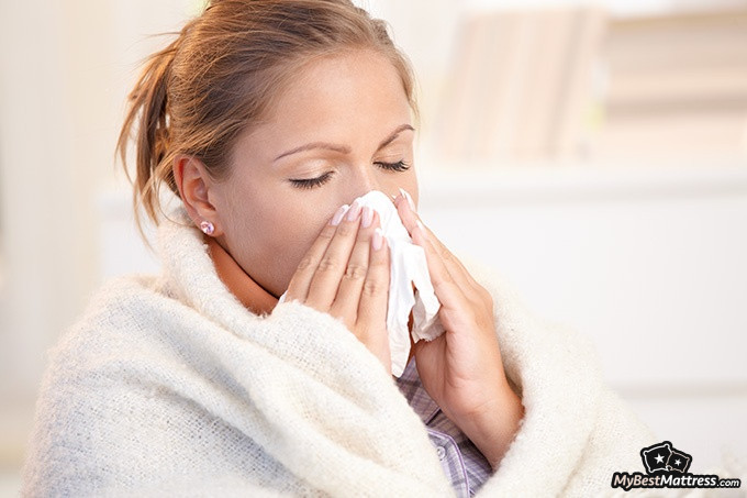 How To Sleep With A Cold: young woman sick with covid.