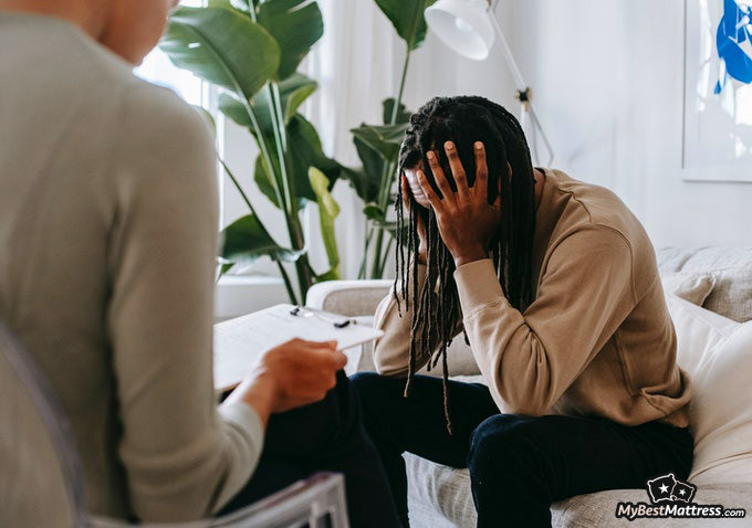 Hypnosis For Sleep: man struggling during a therapy session.