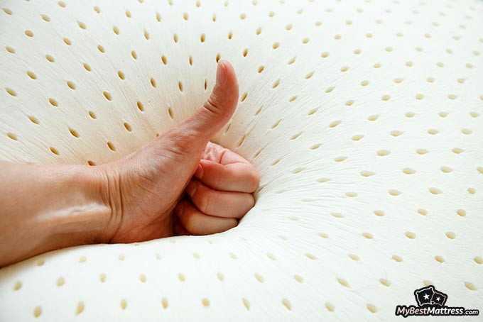 Latex pillow: a thumbs-up for a latex pillow.