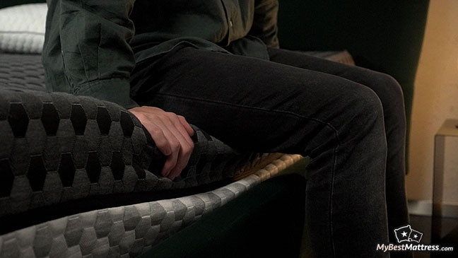 Layla Mattress Reviews: testing the edge support of the mattress.