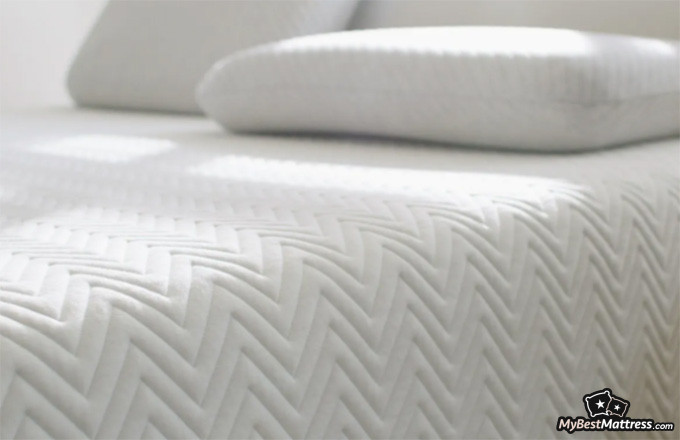Leesa Hybrid Mattress Review: textured mattress pattern with a pillow. Leesa Hybrid Mattress Review: textured mattress pattern with a pillow.