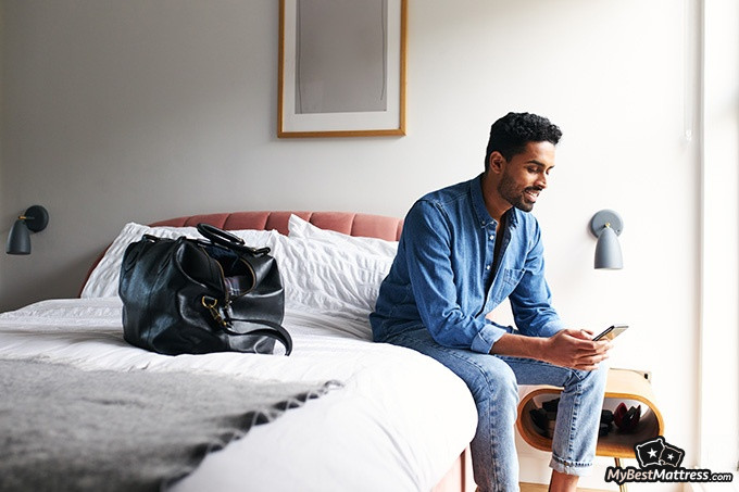 Lucid Hybrid mattress review: a man sitting on the edge. Lucid Hybrid mattress review: a man sitting on the edge.