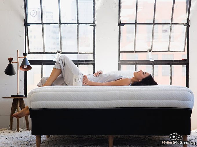 Luxi mattress review: another girl laying on a mattress.