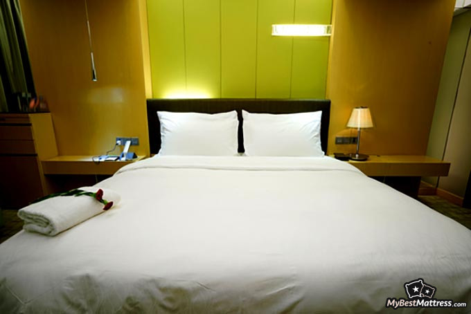 Mattress sizes: a bed in a hotel room. Mattress sizes: a bed in a hotel room.