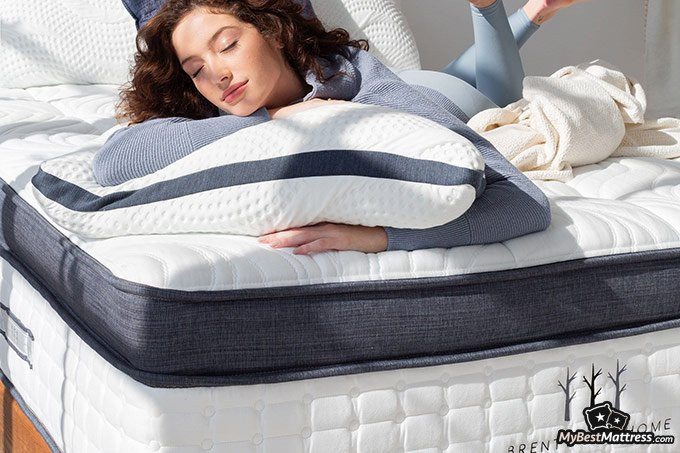 Brentwood Home mattress review: a woman laying on the mattress.