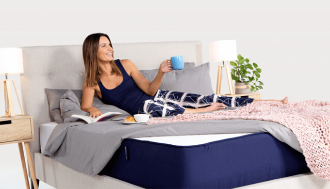 Onebed reviews: woman resting on Onebed mattress. Onebed reviews: woman resting on Onebed mattress.