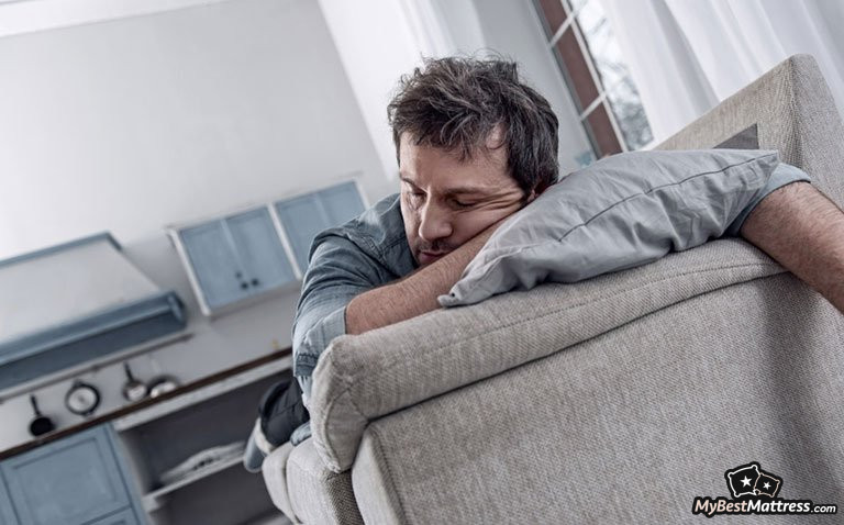 Sleeping too much: tired man asleep Sleeping too much: tired man asleep