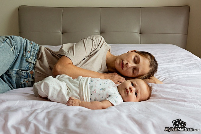 What is Parasomnia: a woman is sleeping next to a baby What is Parasomnia: a woman is sleeping next to a baby