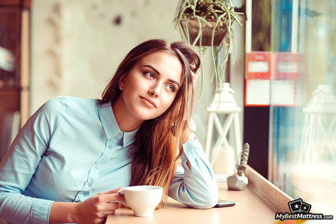 why do we dream: a woman daydreaming