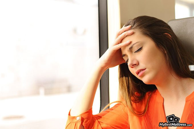 Melatonin and Alcohol: woman feeling dizzy Melatonin and Alcohol: woman feeling dizzy