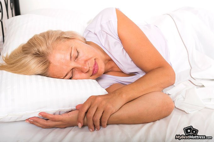 how often should you wash your sheets: woman sleeping
